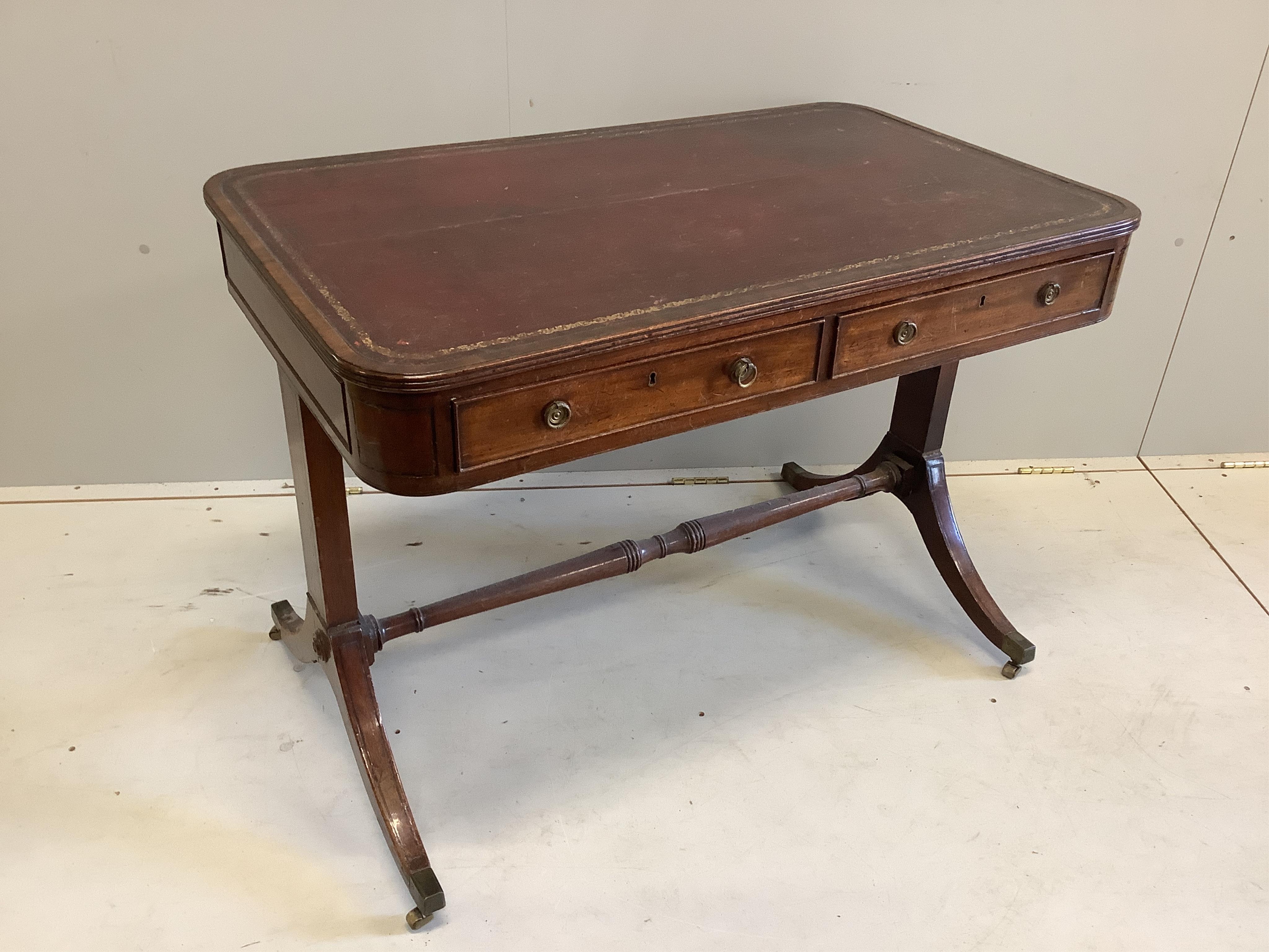 A George IV mahogany two drawer writing table, width 101cm, depth 61cm, height 73cm. Condition - fair